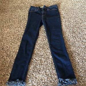 Dark wash fray skinny jeans